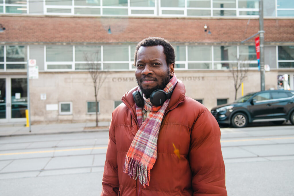 Olivier M. stands across from 167 College St., the former location of the Salvation Army Hope Shelter until 2015.