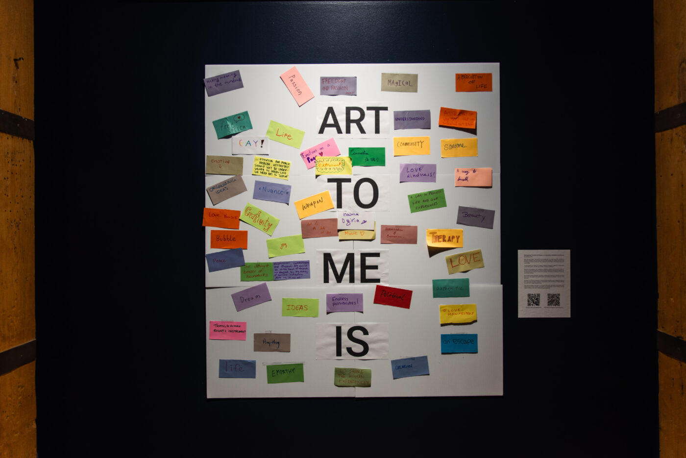 Sticky note responses on a board with large text that reads, "ART TO ME IS."