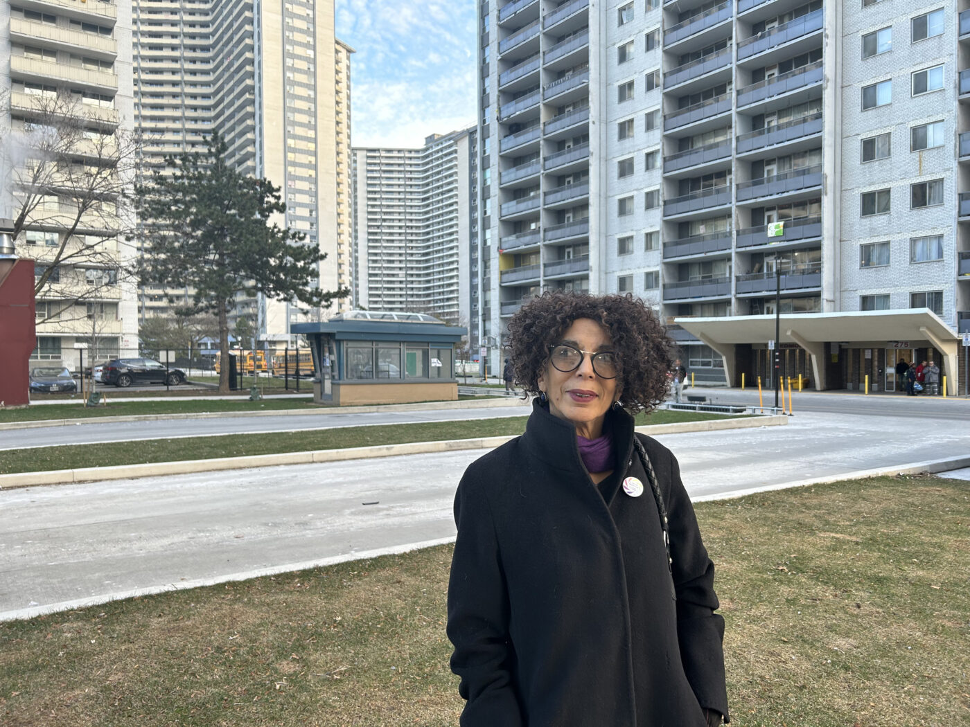 Josephine Grey, President and Co-founder of St. James Town Community Co-Operative, stands outside in the neighbourhood.