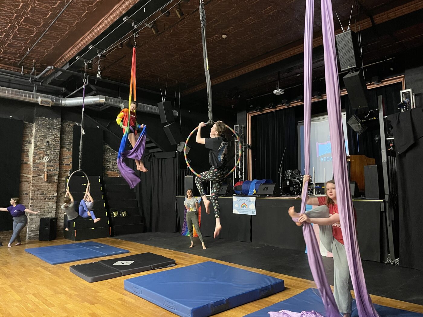 Students practice their circus skills at The Redwood Theatre.