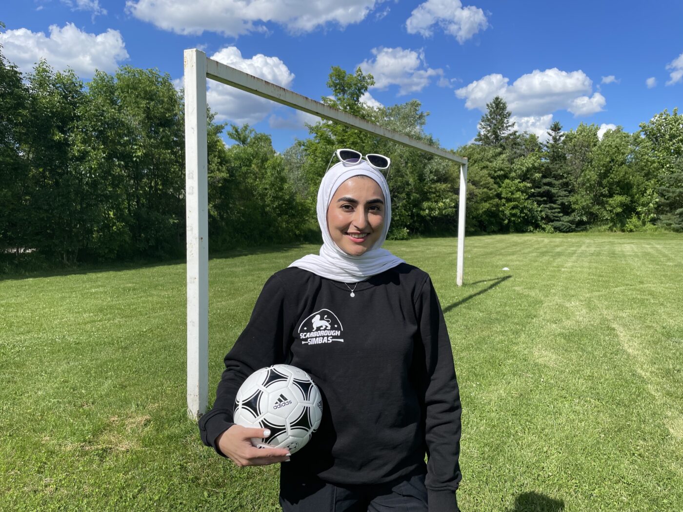 Mohazzama Muhtaj, program director of Scarborough Simbas, stands on the soccer field at Terraview Park in Wexford.