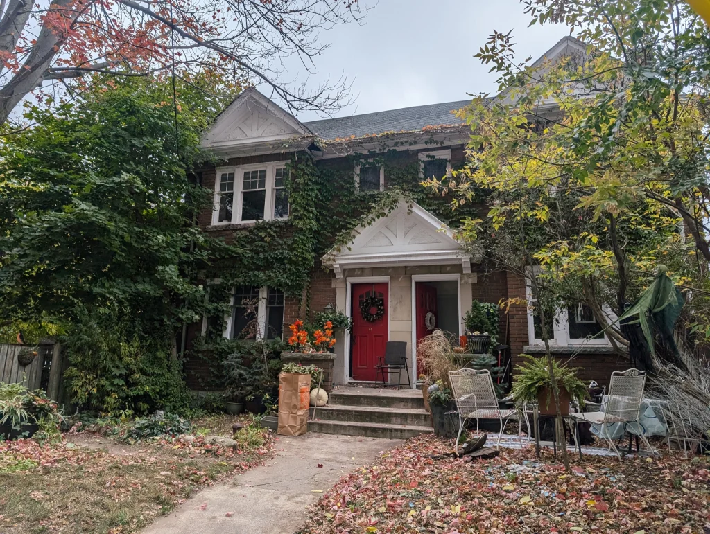 A family house with a red Door.