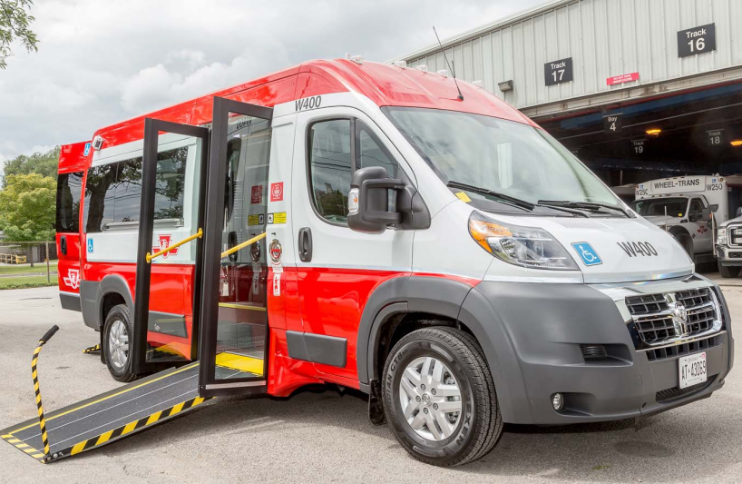 Red and white TTC wheels trans minibus