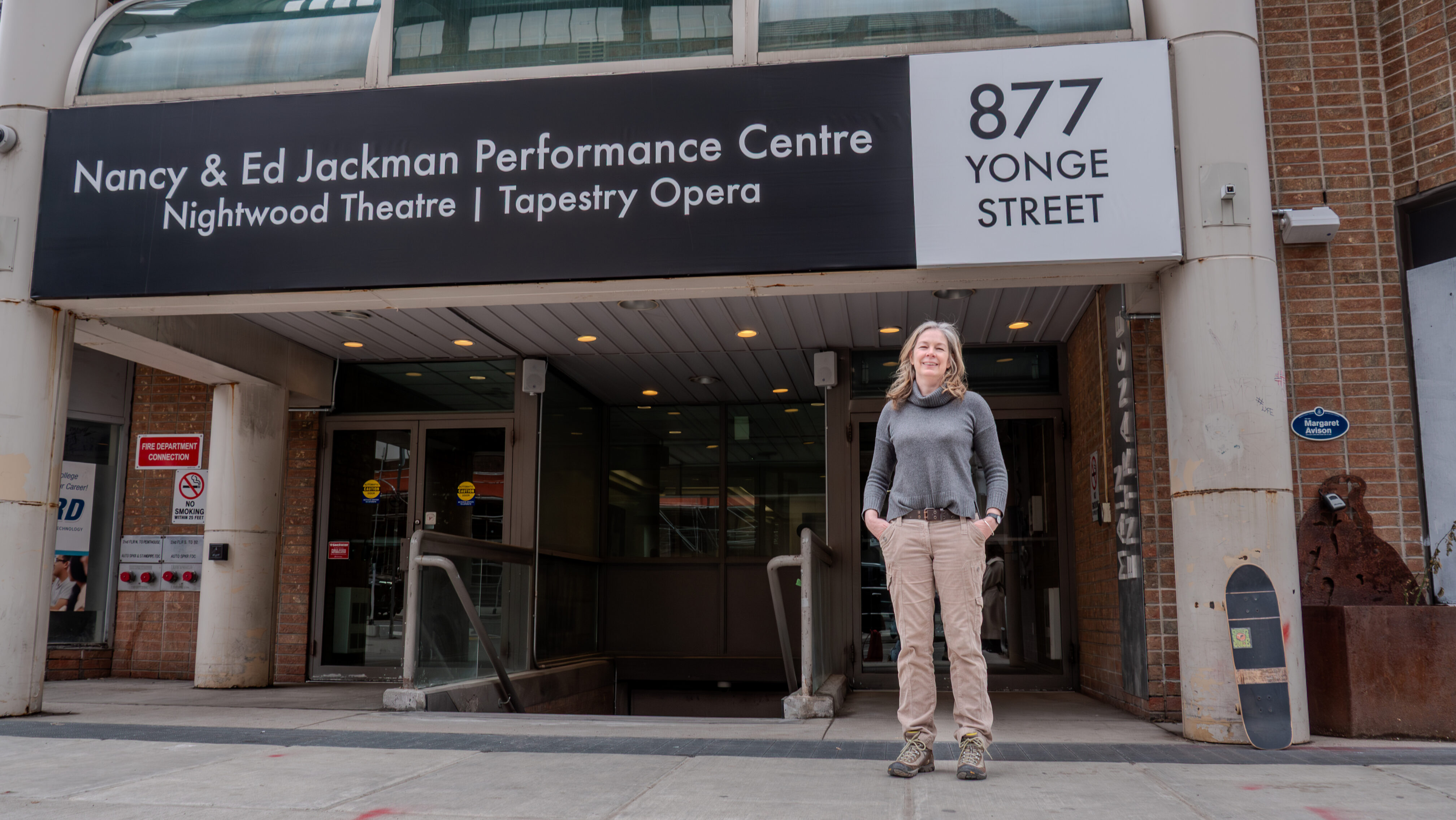Andrea Adams, executive director of St. Clare’s Housing, stands outside 877 Yonge St., a unique affordable housing project.