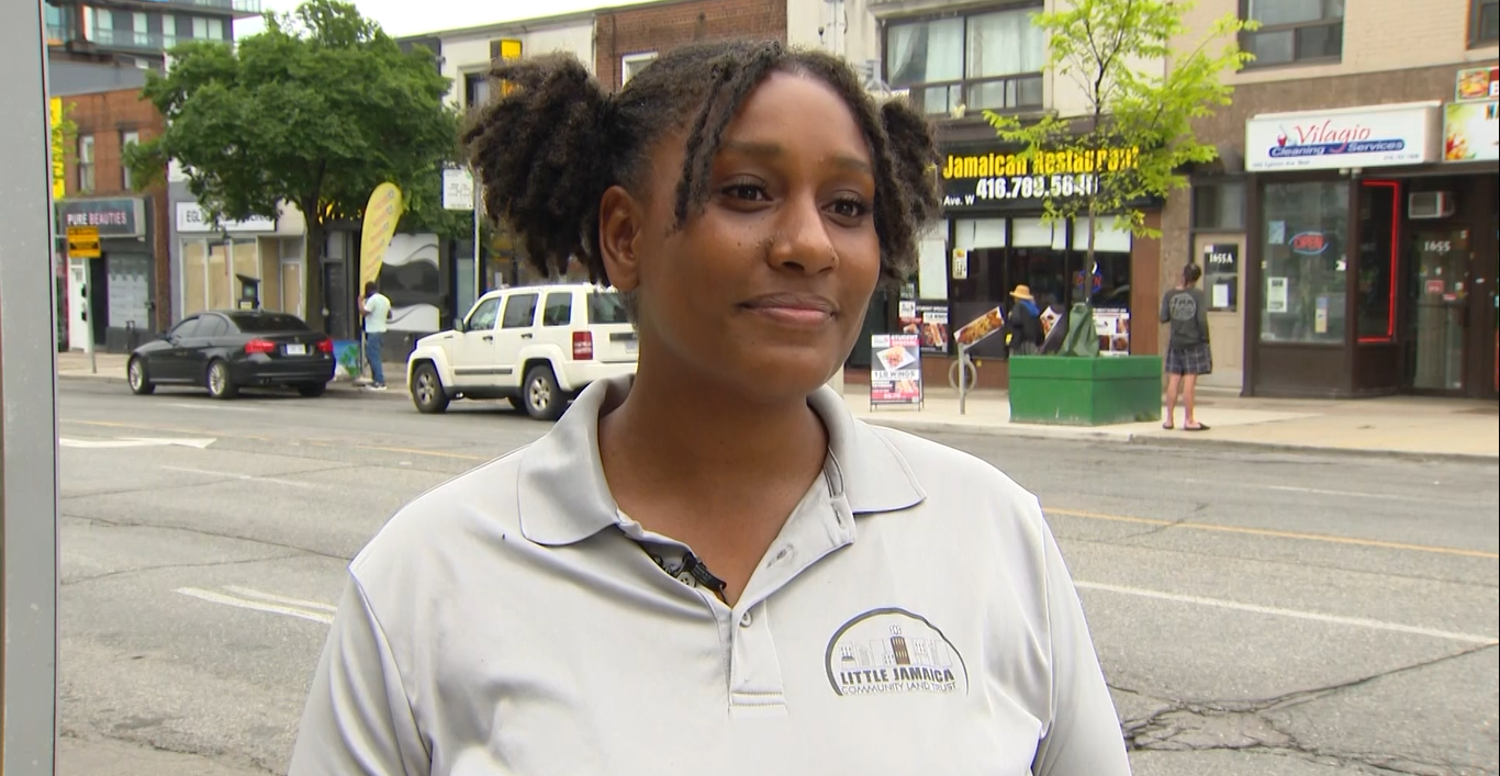 Anyika MArk 2 Anyika Mark, coordinator of Toronto's first Black-led land trust, stands in front of a Jamaican restaurant on Eglinton Avenue West.