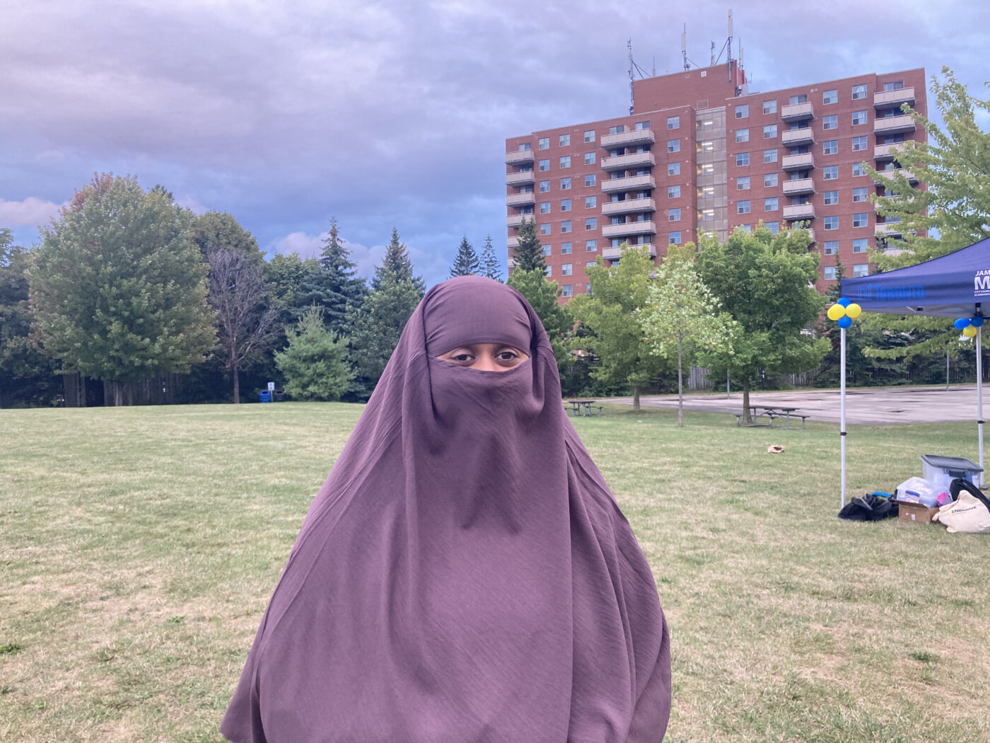 Firdous Hussein stands at Scarborough Farmers' Market to talk about reducing waste.
