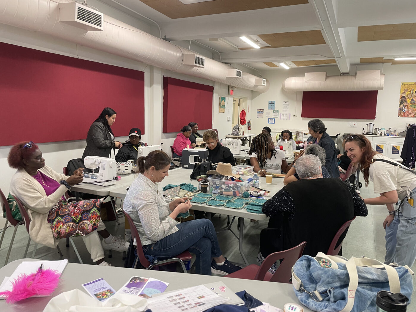 Unhoused women and gender-diverse people from Sistering at Spun Studio work on their individual pieces at 789 Dovercourt Rd.