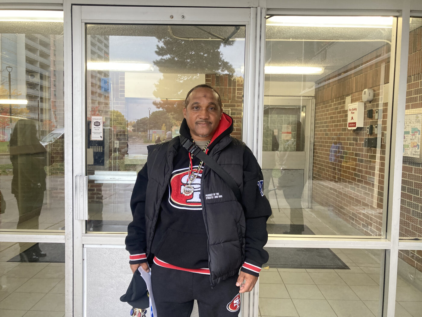 Leon Carpenter stands outside 40 Gordonridge Pl.