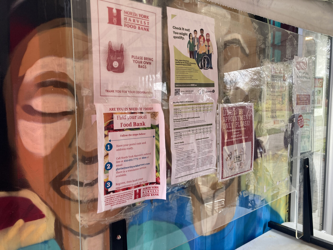 North York Harvest Food Bank sets up a board with posters on using their food space
