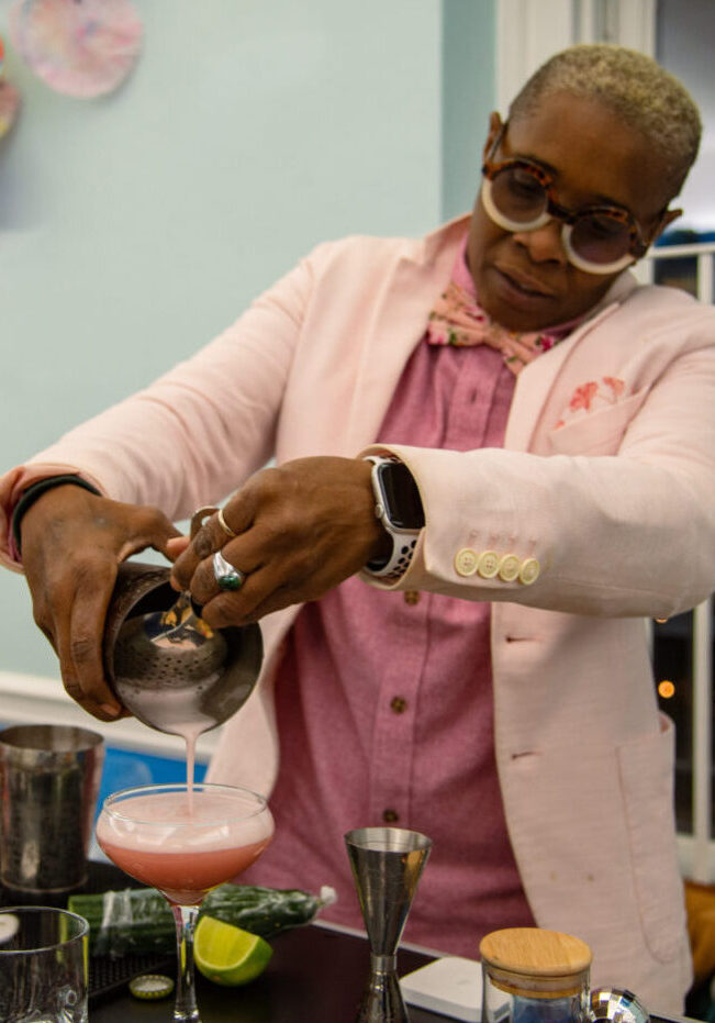 Gail Lynch of ZERO Dry Cocktail Bar prepares a non-alcoholic cocktail at the Winter Marketplace. (Aloysius Wong/The Green Line)