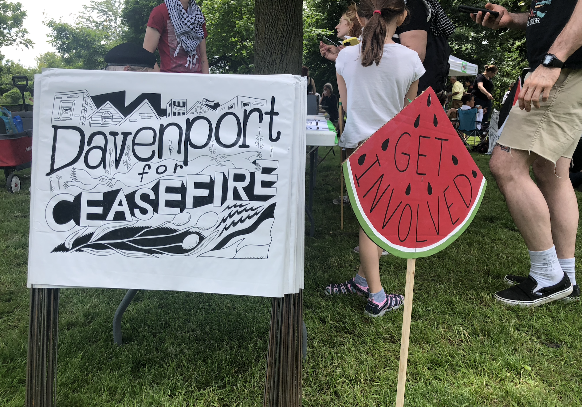 Organizers from Davenport for Palestine set up an information table during a picnic in Earlscourt Park to encourage community members to get involved and display solidarity with Palestine.