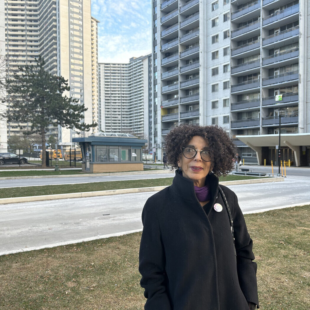 Josephine Grey, President and Co-founder of St. James Town Community Co-Operative, stands outside in the neighbourhood.