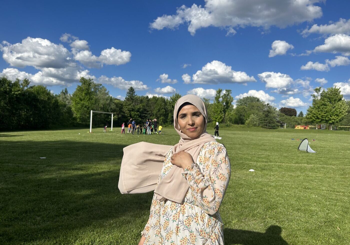 Mariam Omayan, Aljawabrih’s mom, stands in the soccer field at Terraview Park.