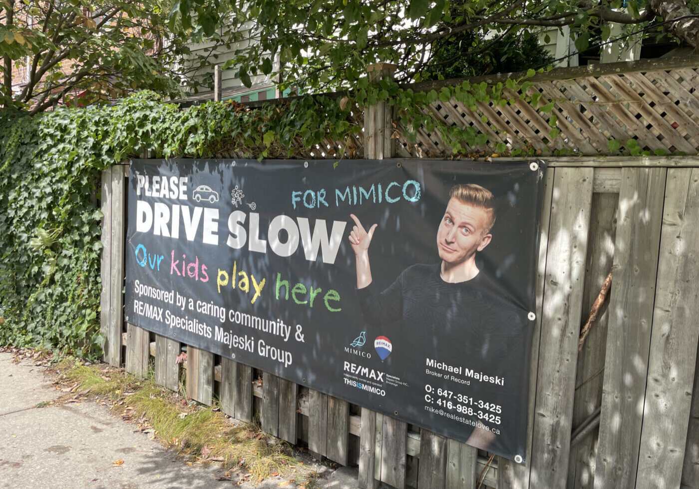 Michael Majeski, vice-president of the Mimico Residents Association, featured in a safe-driving banner in Mimico for road safety.