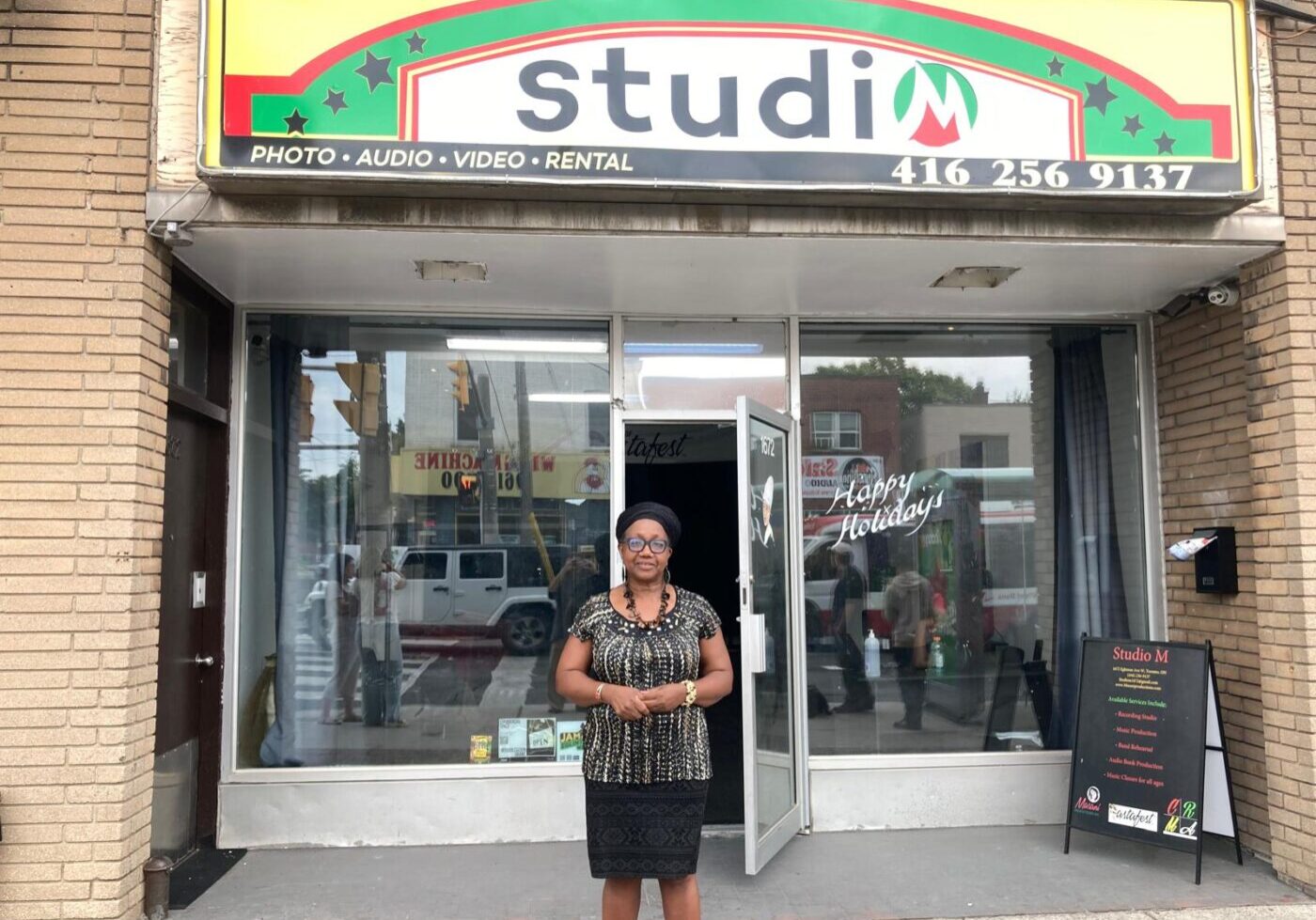 Masani Montague Masani Montague, member of Toronto's first Black-led land trust, stands in front of her business.